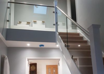 Glass infill on landing and stairs in Bucks