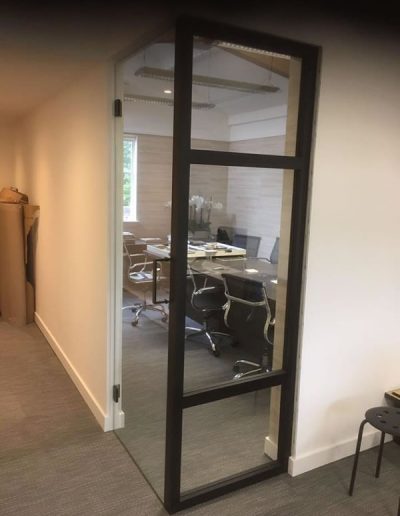 Glass partition for modern office layout