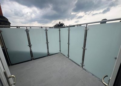 Frosted glass balustrade balcony in south west London