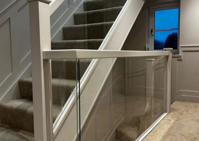 Buckinghamshire home with glass infill panels on staircase and landings