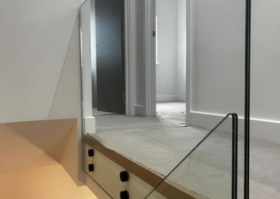 Glass landing balustrade panel in Isleworth