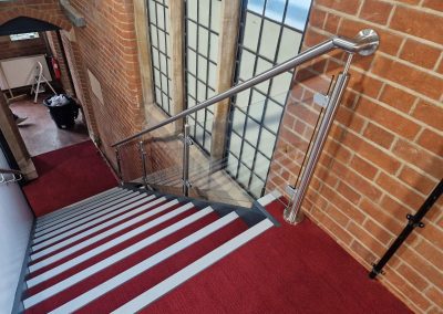 Post and handrail in Harrow