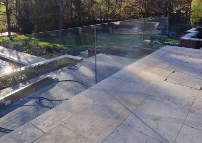 frameless glass balustrade on a residential terrace in Gerrards Cross
