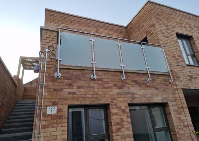 Post and handrail balustrade with frosted glass ion London